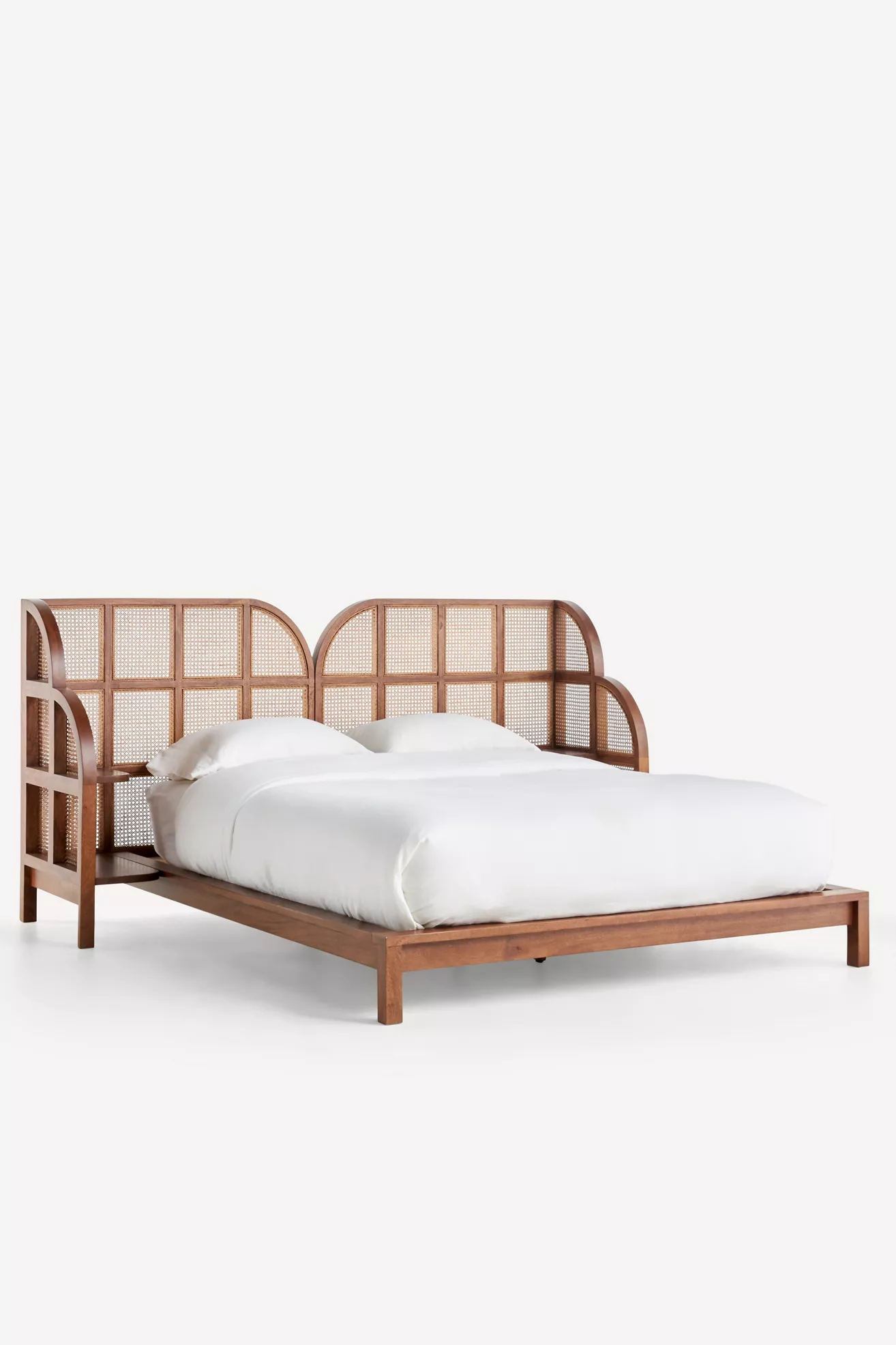 Full bed with white bedding