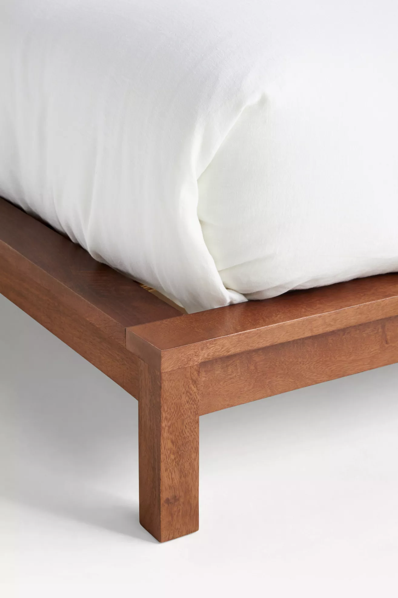 Corner of bed frame with leg