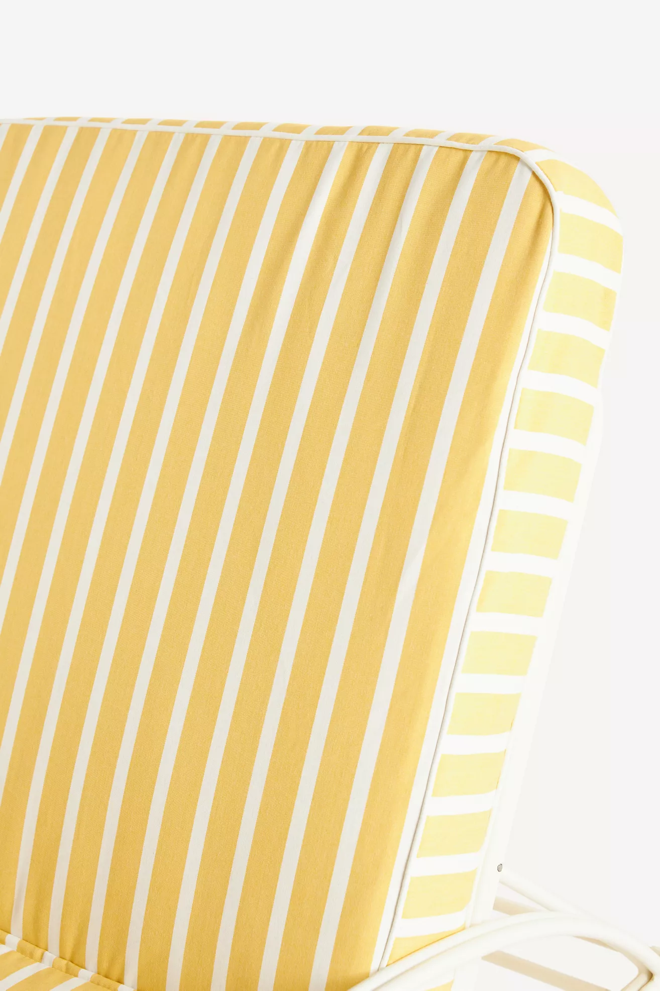 Close-up of cushion corner and piping