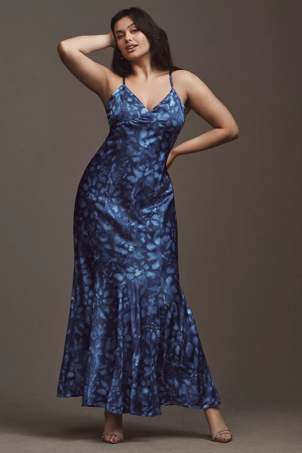 A plus-size, blue printed maxi slip dress
