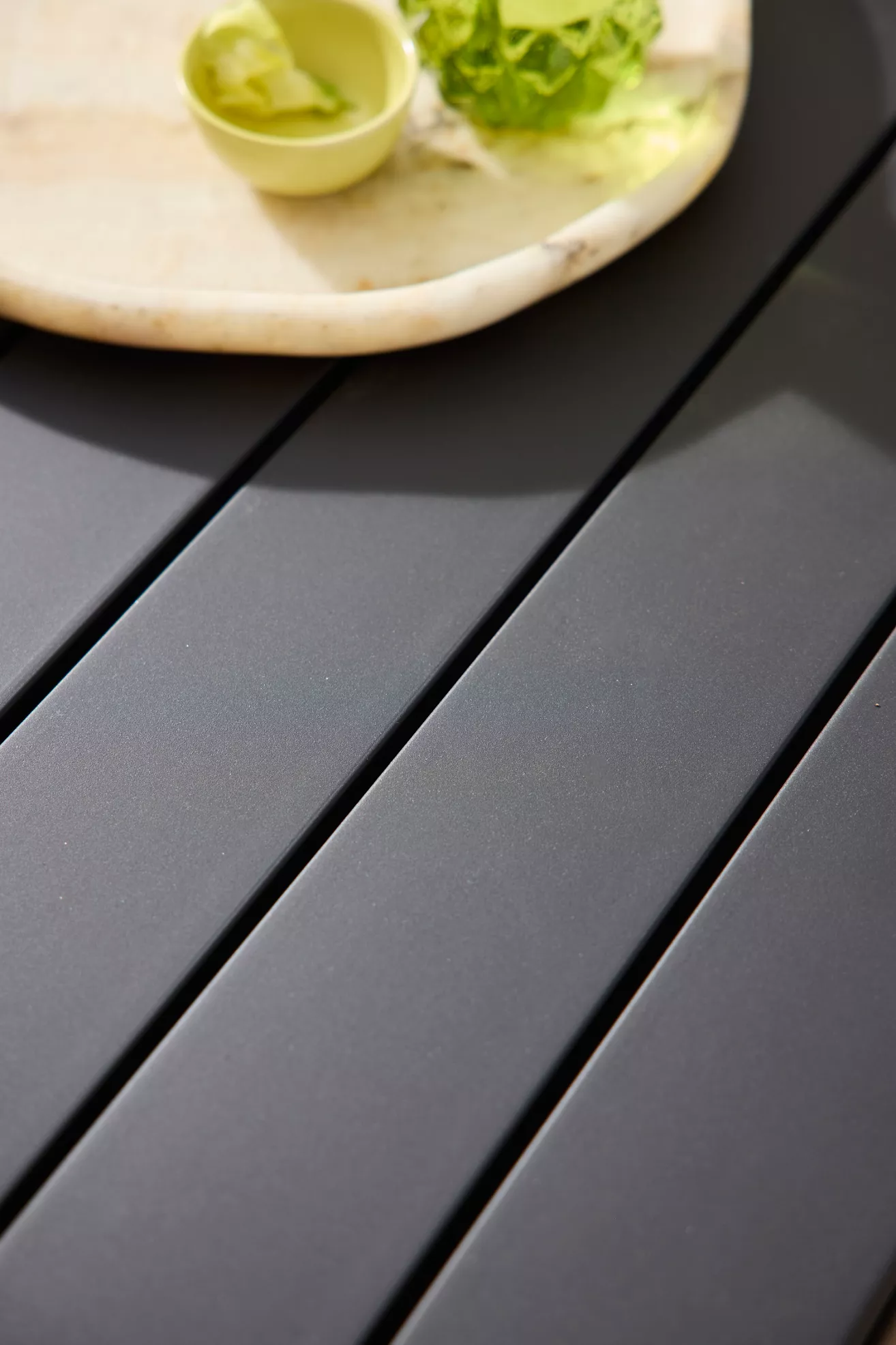 Table top close-up showing slat gaps and finish