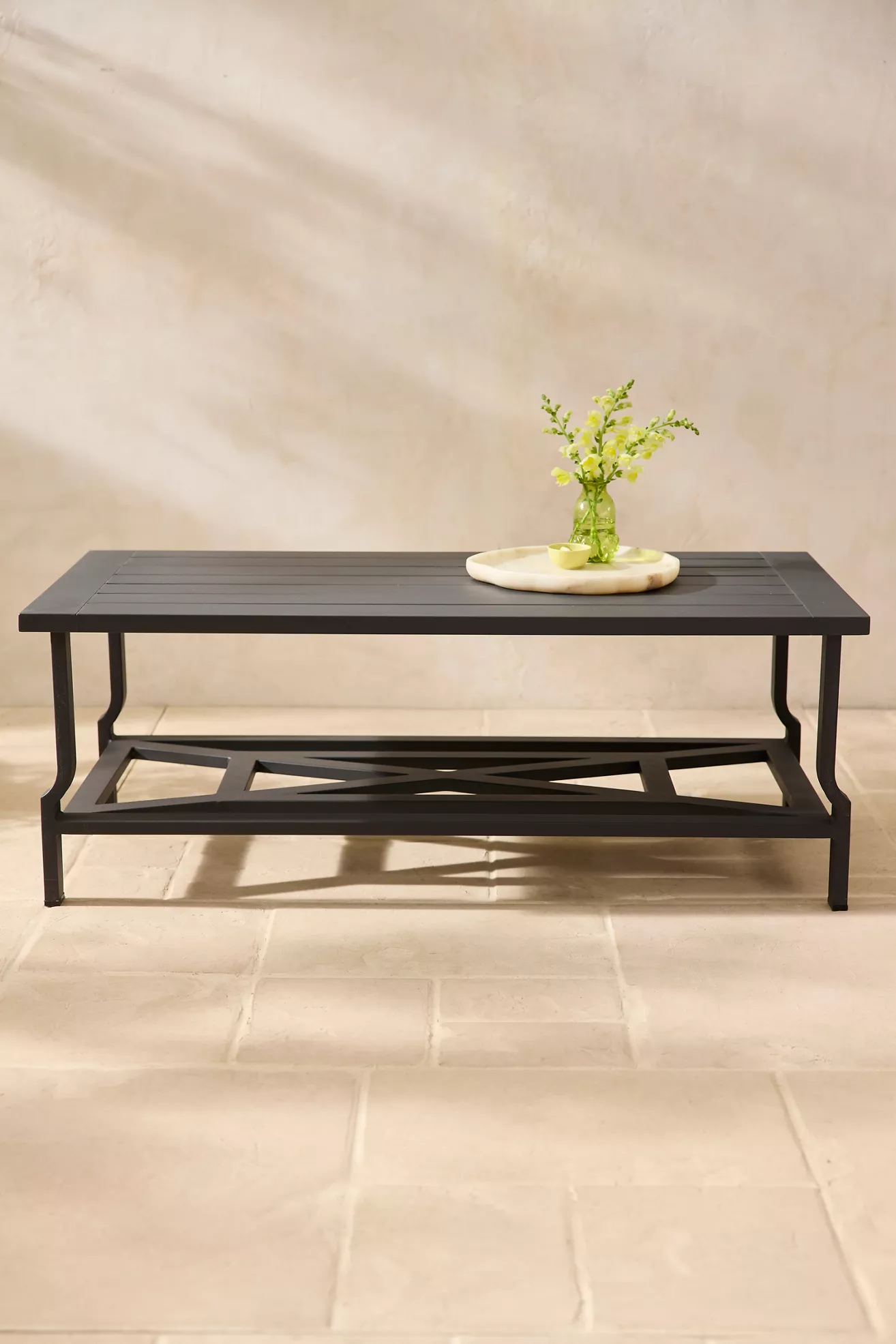 Full table on a tiled floor with a small centerpiece