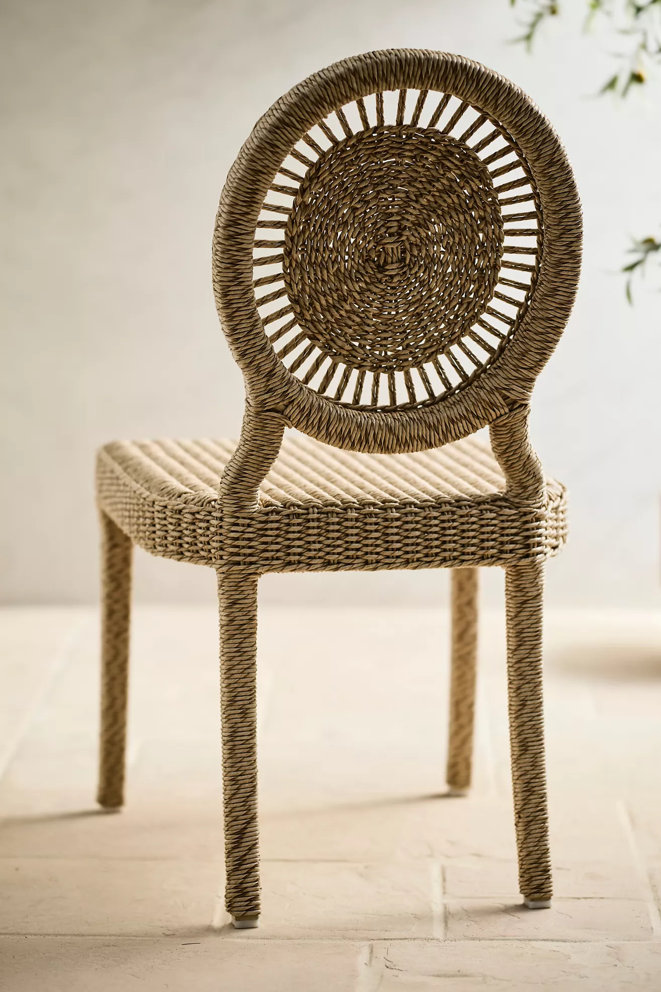 Sunburst all weather wicker dining chair side view