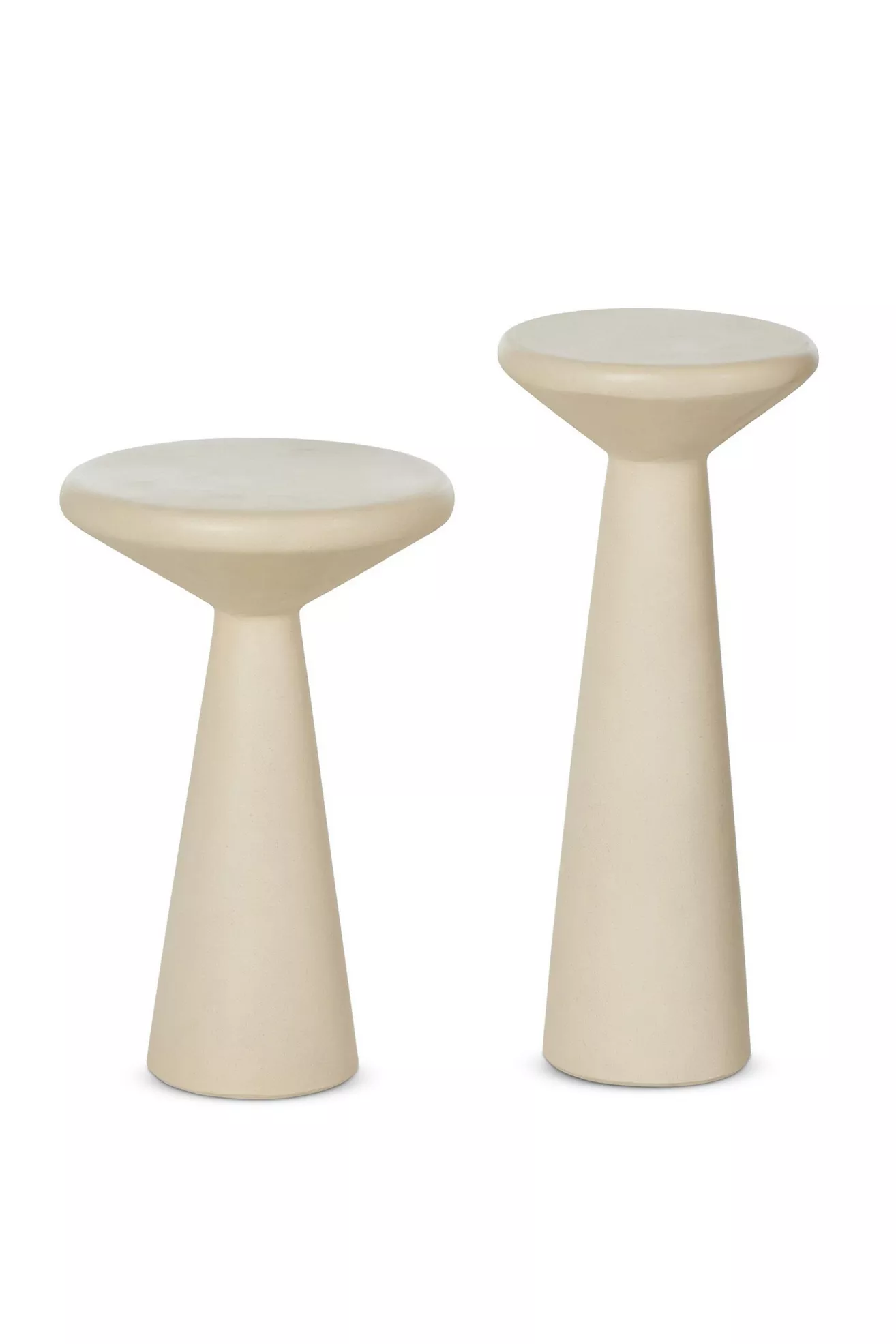 Pair of beige pedestal tables of different heights