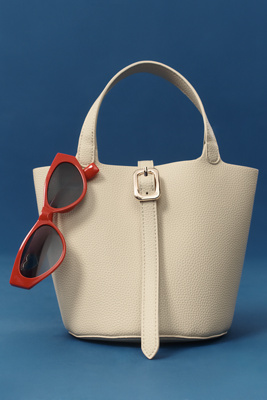 By Anthropologie Mini Pebbled Faux-leather Bucket Bag In Yellow