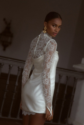 De La Vali Croissant Long-sleeve Lace Mini Dress In White