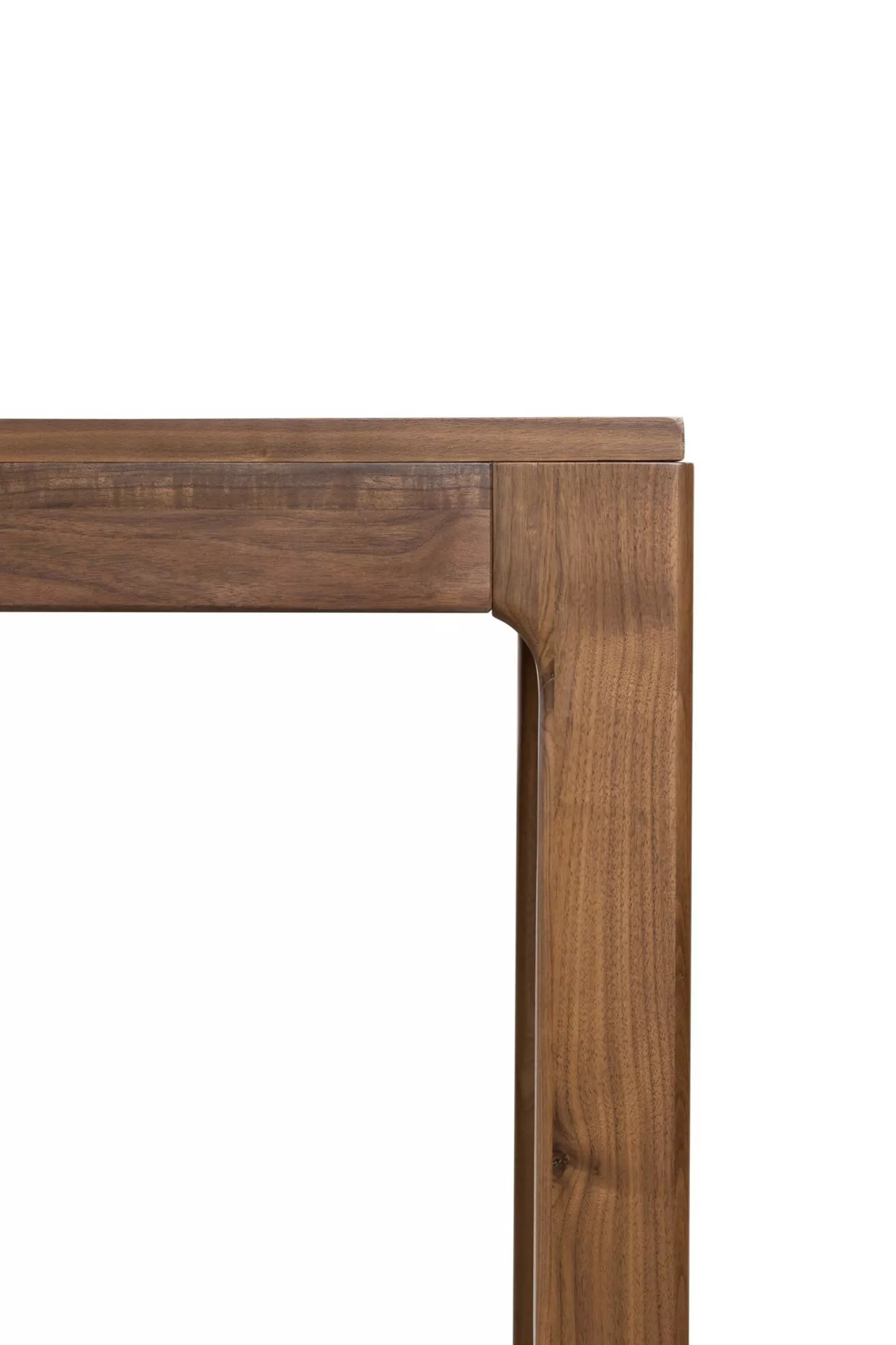 Close-up of Arturo 94 table leg and corner junction in wood finish