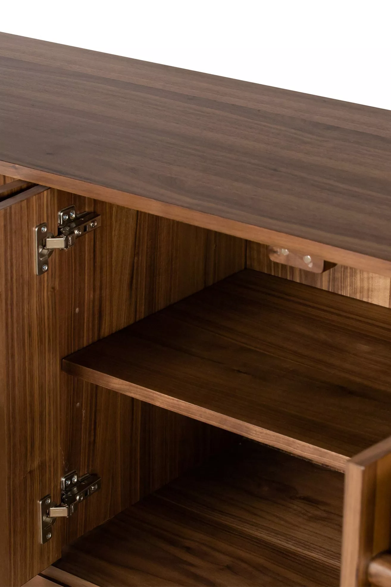 Close-up of hinge and interior shelf