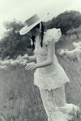De La Vali Nephele Lace Flutter-sleeve Fishtail Maxi Dress In White