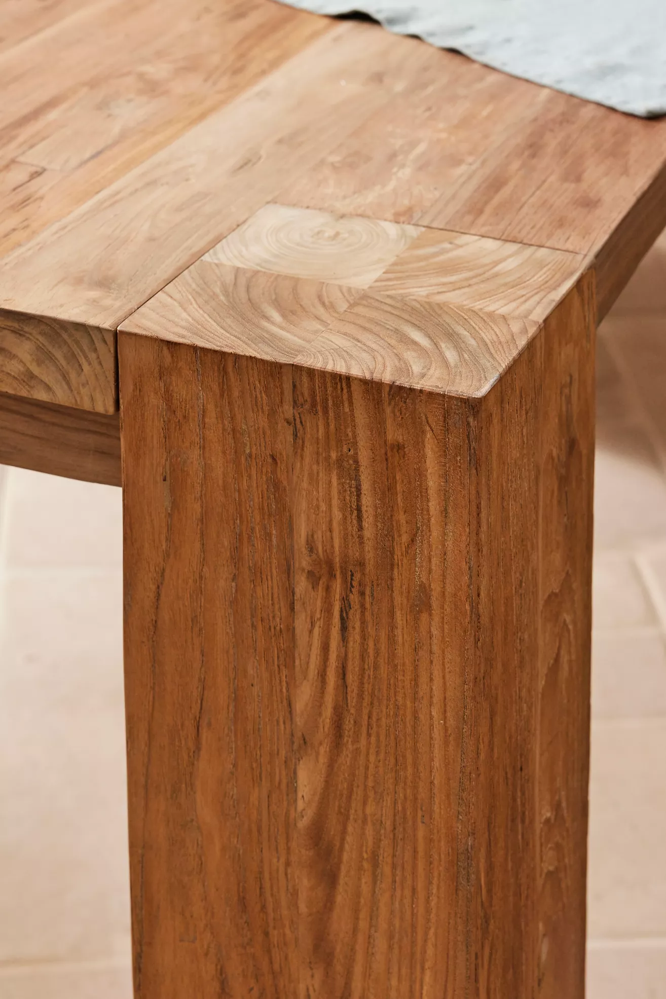 Close-up of table corner junction with wood grain