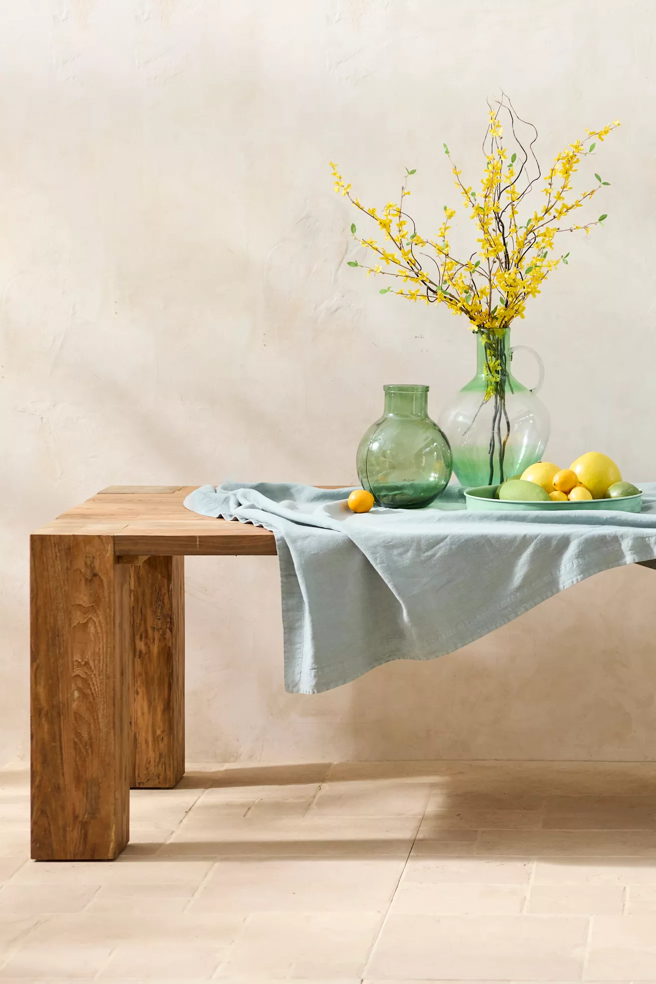 Close-up of table edge and collected fruit on table
