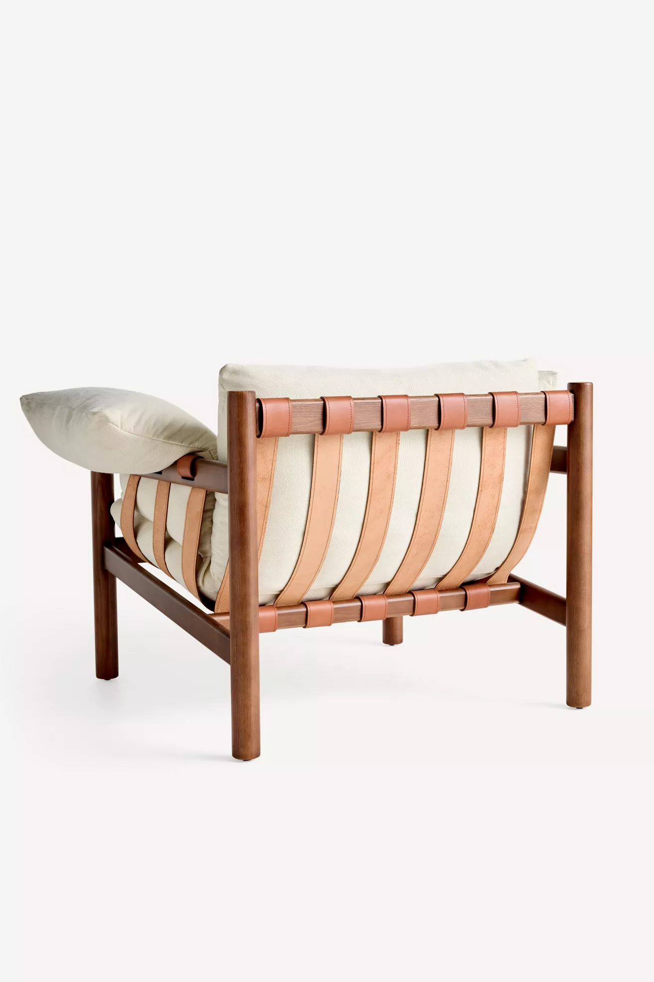 Rear-right angle of chair with leather strap detail and cushion