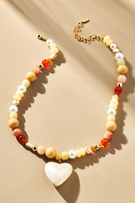 By Anthropologie Beaded Icon Charm Necklace In Orange