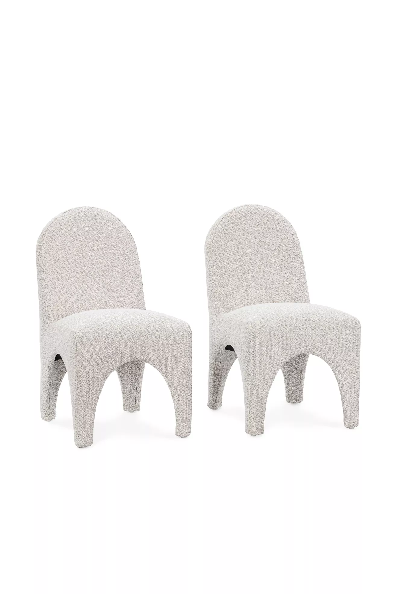 Two upholstered dining chairs facing inward