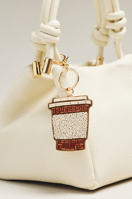By Anthropologie Beaded Coffee Bag Charm In Sand