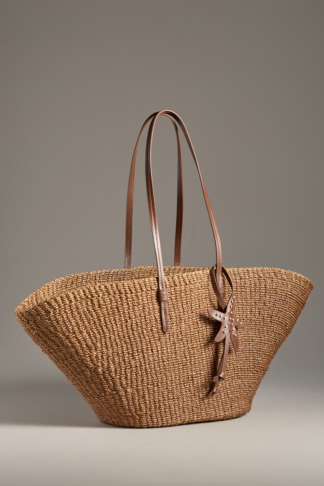 POOLSIDE The East West Raffia Charm Tote