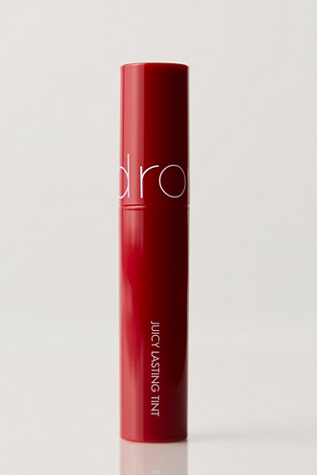rom&nd Juicy Lasting Tint at Free People in Red