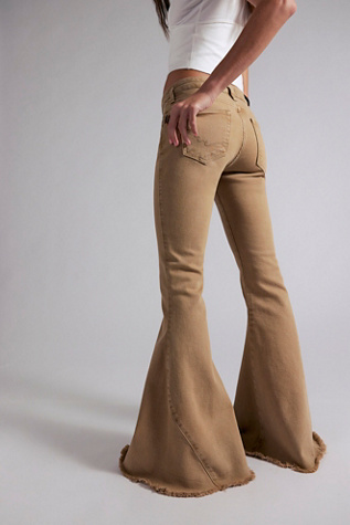 white flare dress pants Flare Pants in White with Basque Waistline