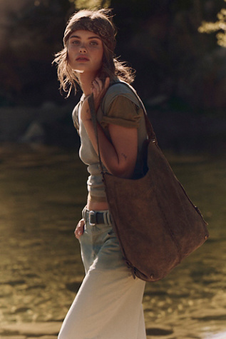 We The Free Dallas Distressed Leather Bag at Free People in Brown