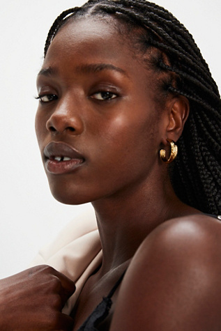 Brenda Grands Hammered Hoops at Free People in Gold