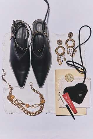 Talons enveloppants cloutés Tell Me About It