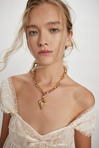 Paula Rosen Riley's Heart Necklace at Free People in Gold
