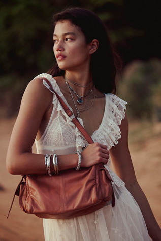 Cassie Convertible Sling Bag by Free People in Brown