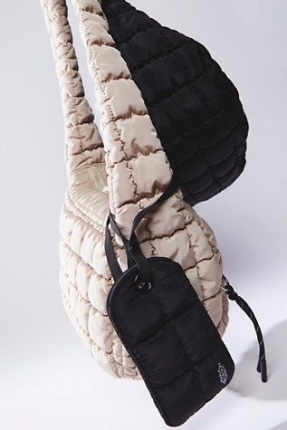 On The Move Quilted Luggage Tag at Free People in Black