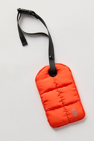 On The Move Quilted Luggage Tag at Free People in Flame