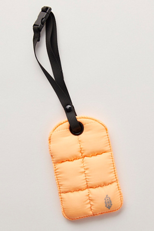 On The Move Quilted Luggage Tag at Free People in Neon Clementine