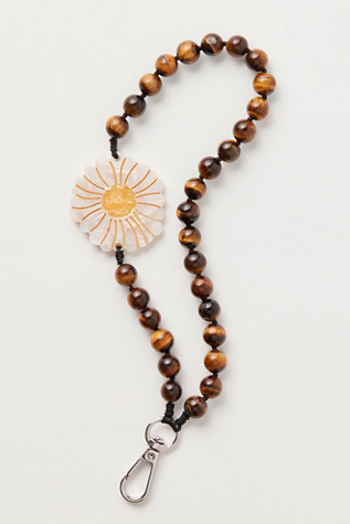 Solar Eclipse Bracelet Phone Chain at Free People in Brown