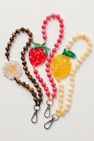 Solar Eclipse Bracelet Phone Chain at Free People in Red