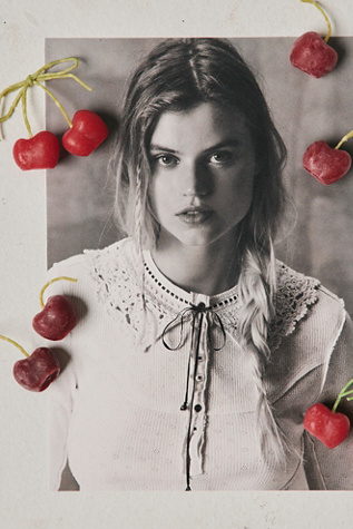 Bow Tied Cherry Candle by Free People in Red