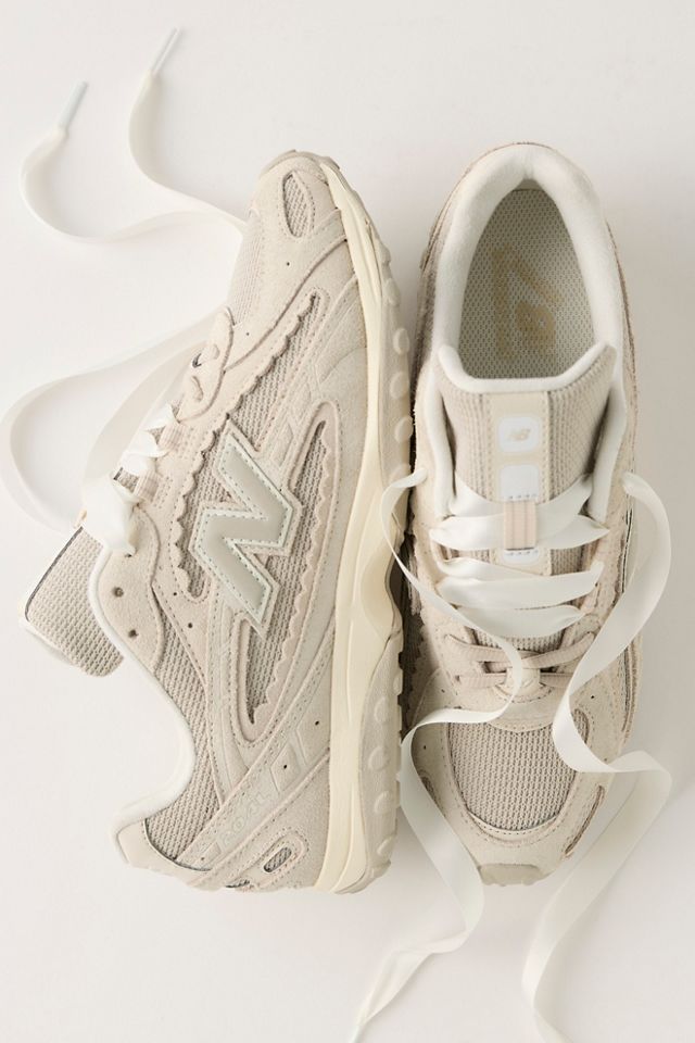 New Balance 204L Sneakers | Free People