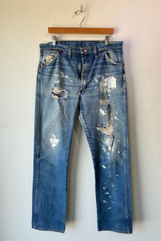 Wrangler Distressed and Paint Splattered Jeans Selected by The Curatorial Dept.
