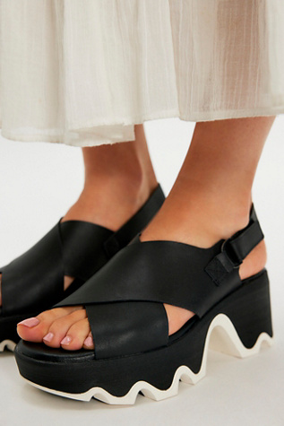 SOREL Kinetic Aura Slingback Sandals at Free People in Black, Size: US 8