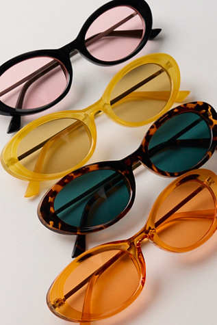 Mae Oval Sunglasses by Free People in Brown