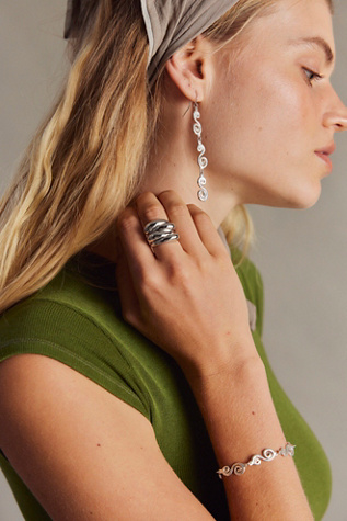 Takara Spiral Dangle Earrings at Free People in Silver
