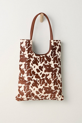 Bronson Cowhide Tote Bag at Free People in Brown Pattern
