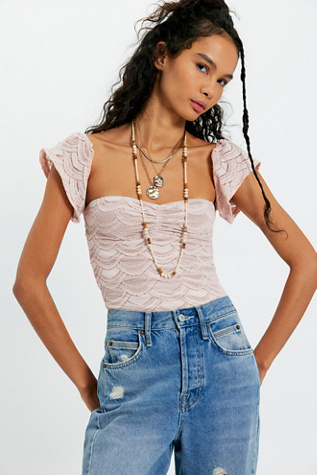 Nightcap Flutter Lace Bodysuit at Free People in Pink, Size: M
