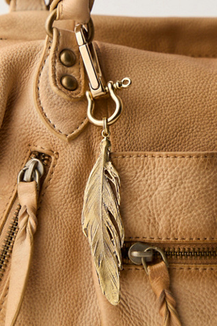 Alkemie Feather Bag Charm at Free People in Gold