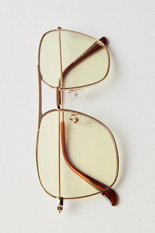 Ryder Aviator Bluelight Glasses by gabriel + simone at Free People in Gold