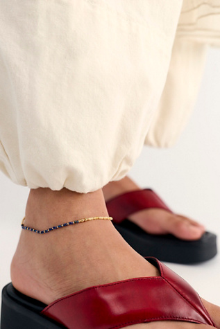 FP x Kozakh Leo Semiprecious Stone Anklet at Free People in Lapis And Yellow Opal
