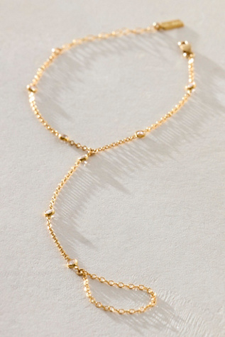 Set & Stones Serra Hand Chain at Free People in Gold