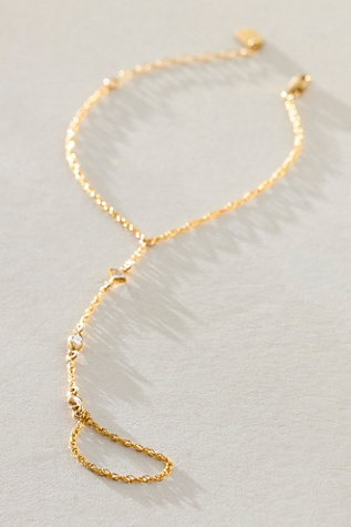 Set & Stones Tavi Hand Chain at Free People in Gold
