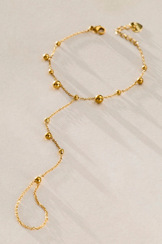 Bracha Bella Hand Chain at Free People in Gold