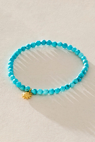 Satya Turquoise Sun Bracelet by Satya Jewelry at Free People in Blue