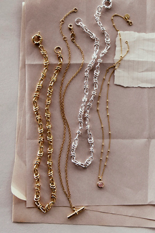 Collier à nœud Polly plaqué or Daisy London