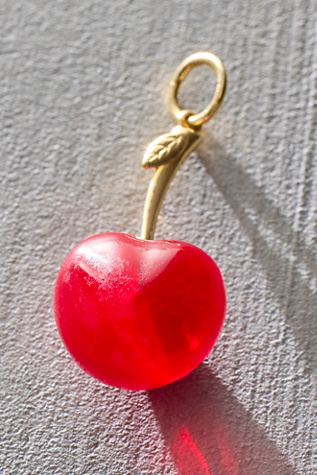 Maura Green Cherry Bomb Charm at Free People in Red