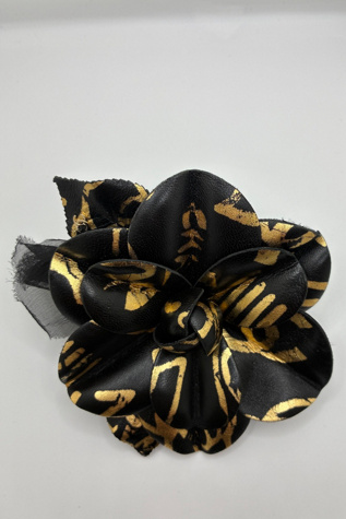 CHANEL Black and Gold Leather Camellia Brooch Selected by The Curatorial Dept.